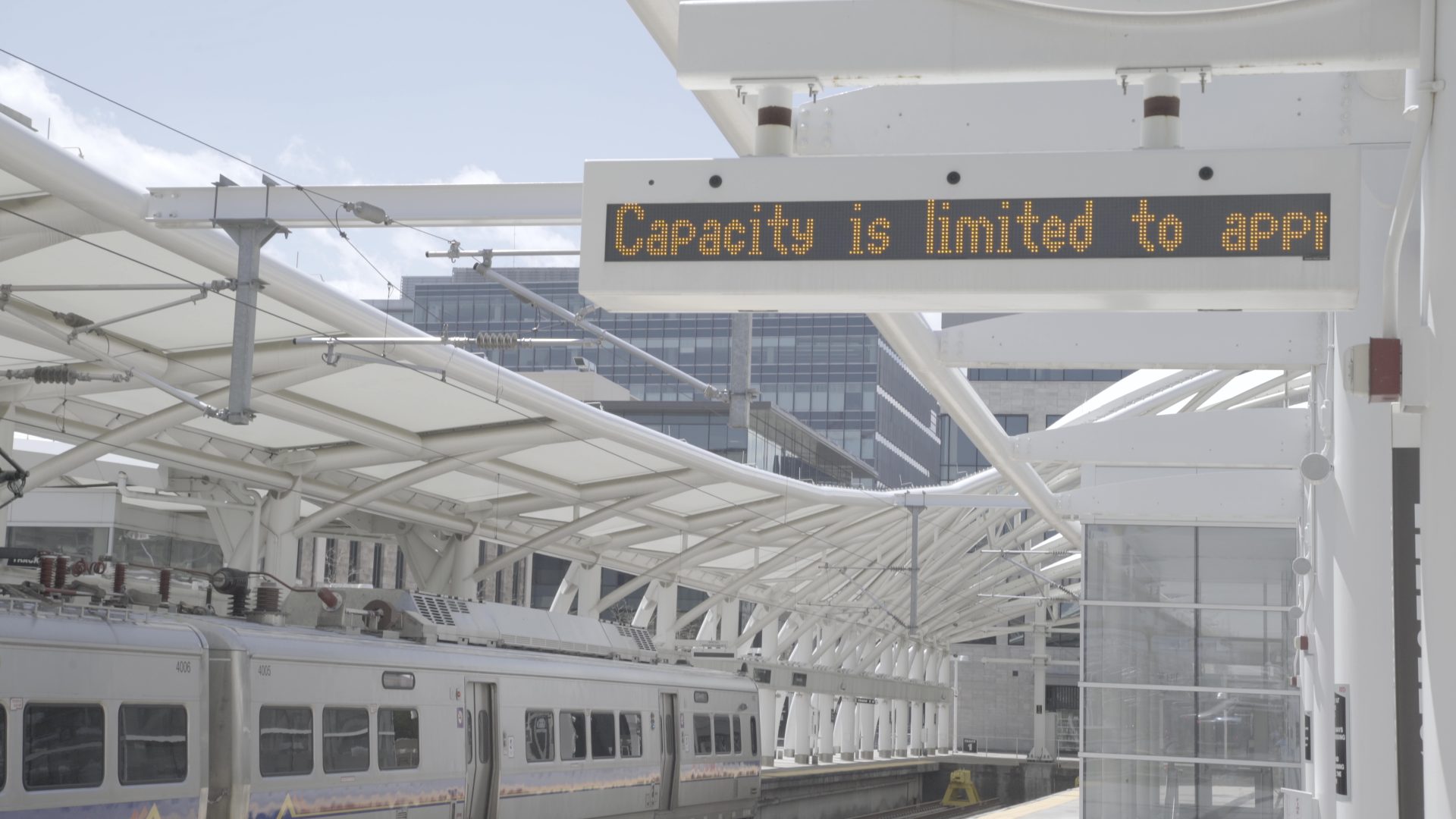 Sony A7rII screen grab of a message at Union Station for awareness of capacity limiting passengers on trains. 